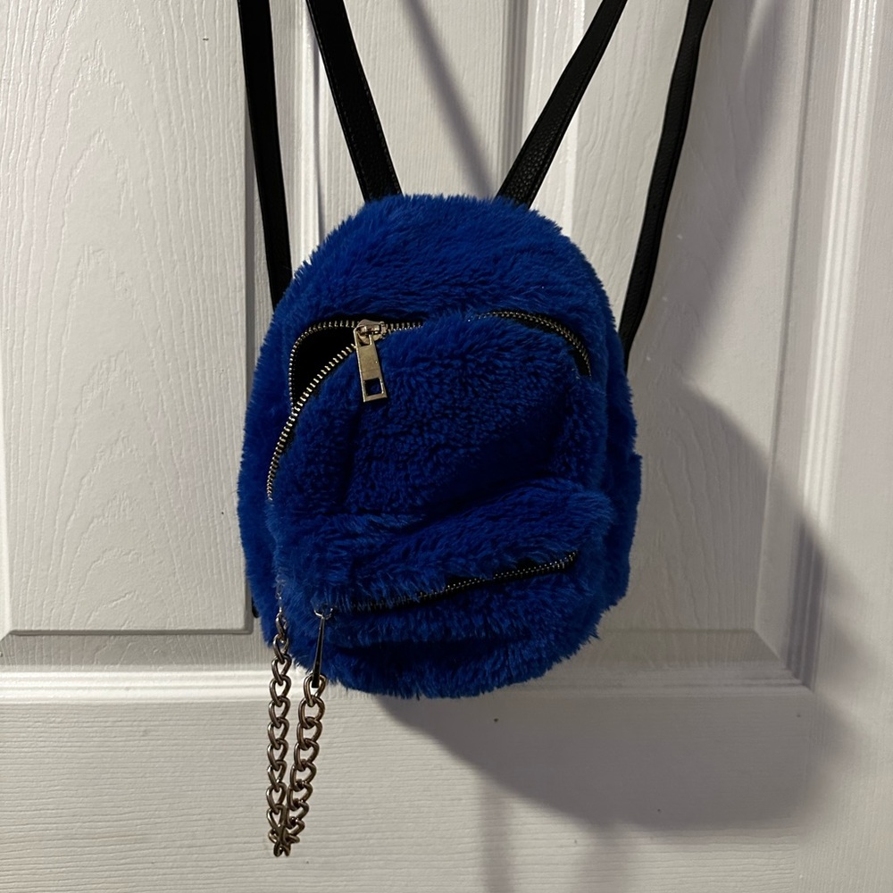 Blue fuzzy backpack purse